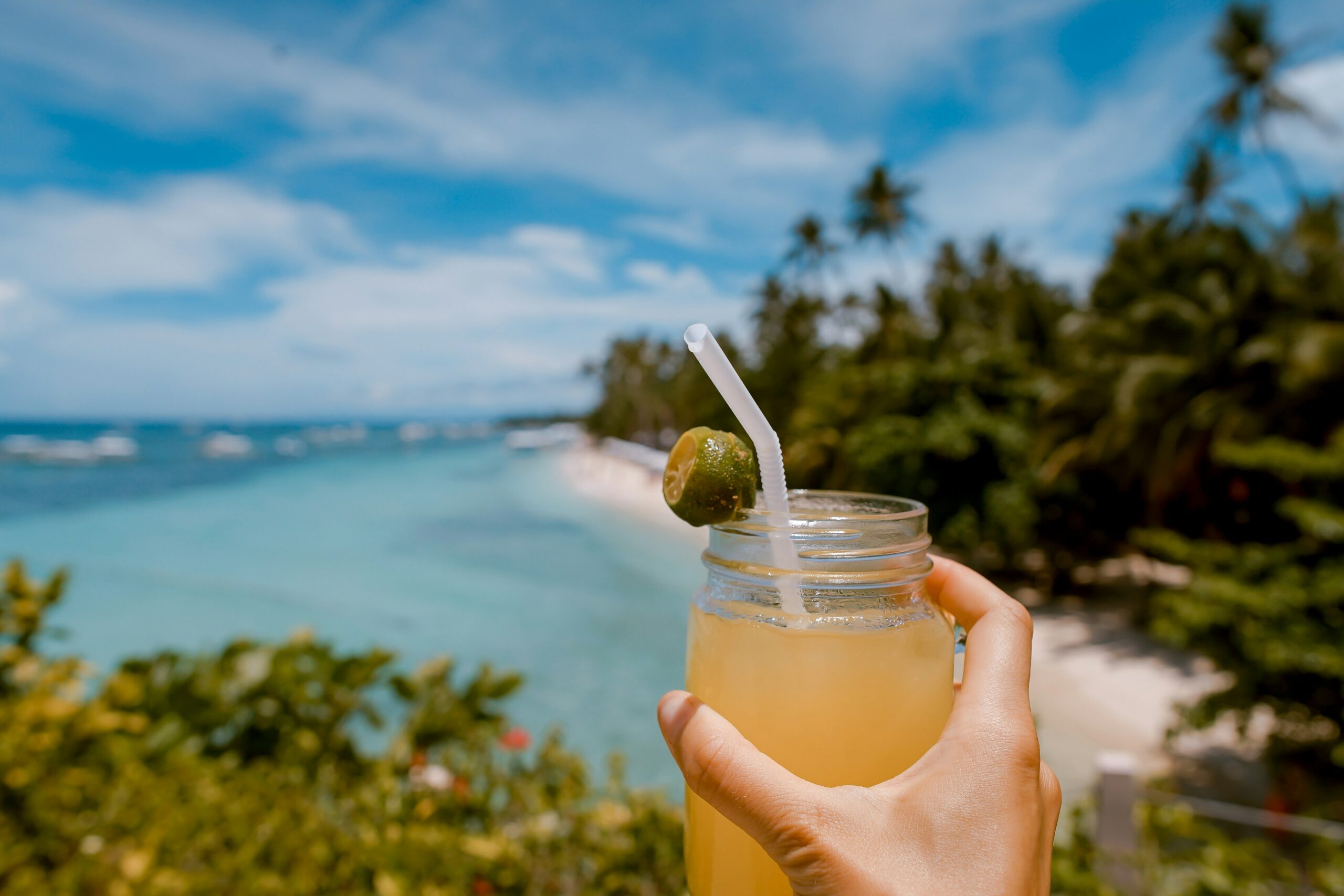 Sunny beach and a refreshing drink